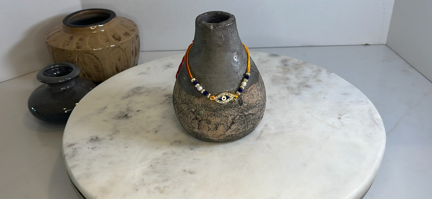 Nazar Rakhi in a dori RK04