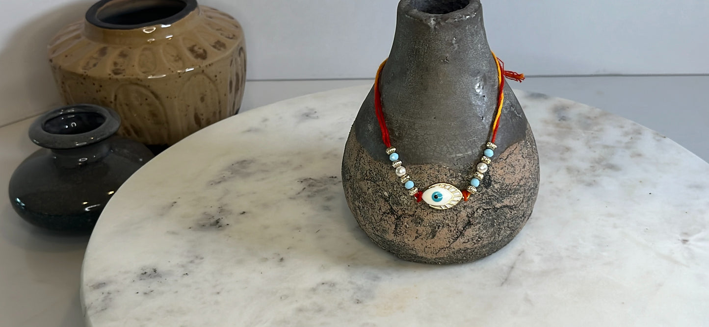 Nazar Rakhi in a dori RK04