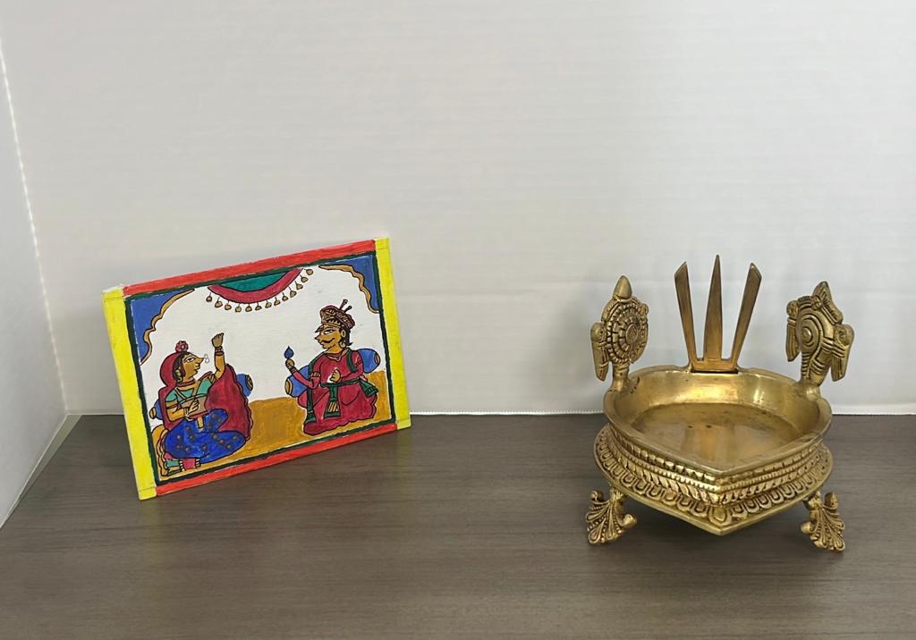 Brass urli with Sankh Chakra