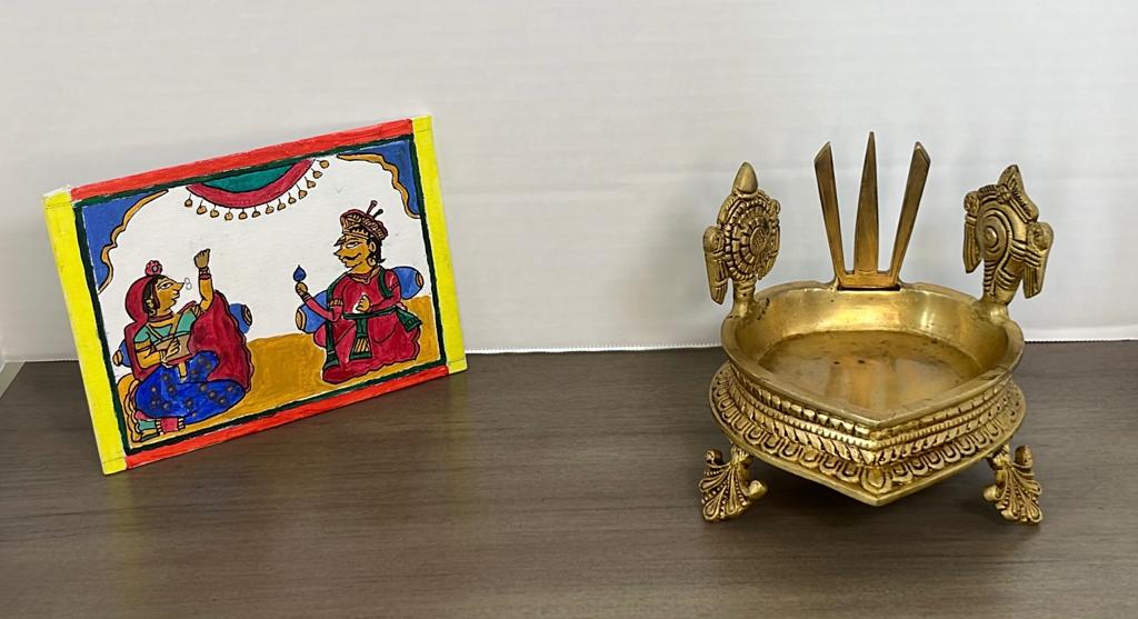 Brass urli with Sankh Chakra